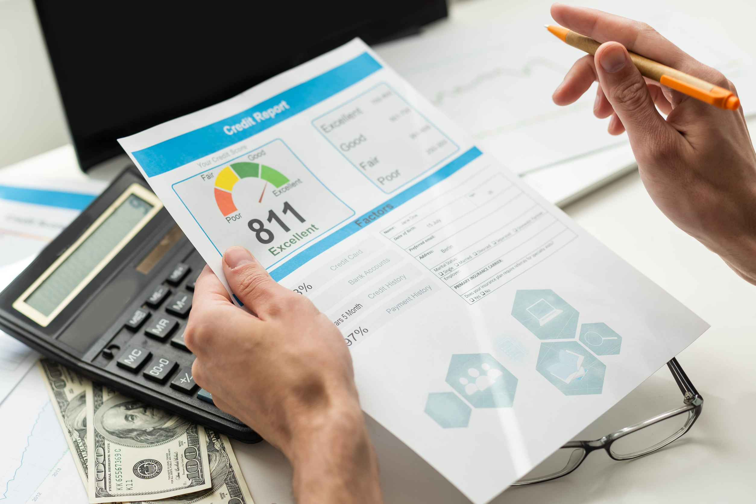 Buying a Home on Lake Lanier: The man checks the credit report and how many credit points.
