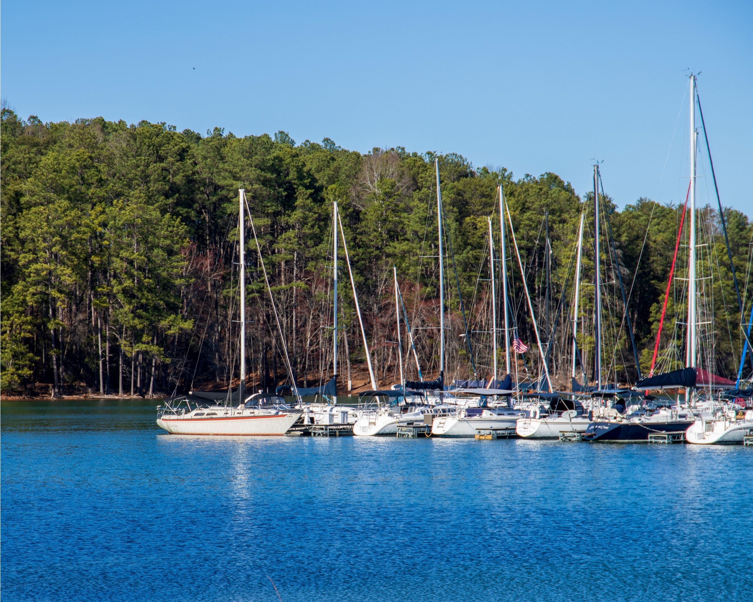 Buying a Home on Lake Lanier: Harbor engineer holding the paper, construction work, smiling.